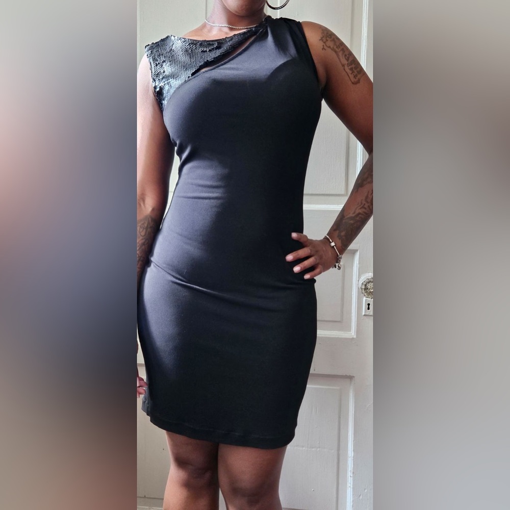 Little sewing black dress by Jennifer Lopez